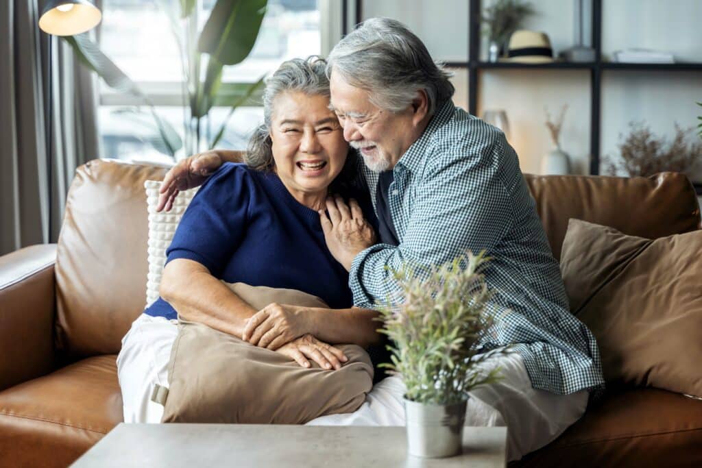 old senior asian retired couple enjoy talking conversation toget