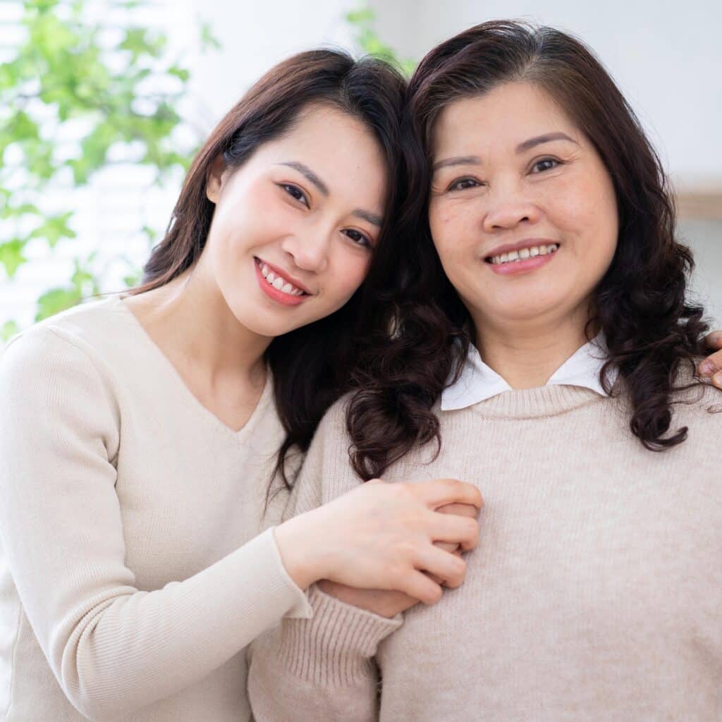 Image of Asian mother and daughter at home